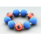 bracelet perles boules Coraline fond corail clair fleur bleu & corail 