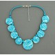 collier perles plates réversible transparent turquoise / visage fleur turquoise