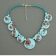 collier perles plates réversible fond turquoise clair fleur marron /  transparent turquoise