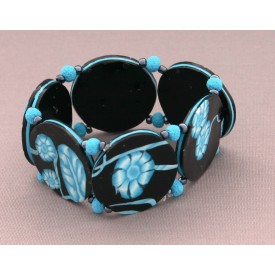 bracelet perles plates  fond noir fleur turquoise
