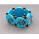 bracelet perles plates  fond turquoise fleur turquoise & marron