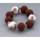 bracelet perles boules fond transparent fleur marron