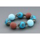 bracelet perles boules  fond turquoise fleur turquoise & marron