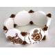 Bracelet perles plates Brune fond blanc fleur brune