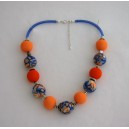 Collier perles boules Maïlys jeu de transparence, fleur orange