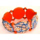 bracelet perles plates Maïlys  jeu de transparence, fleurs orange