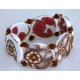 bracelet perles plates Brune réversible fond blanc fleur rose / transparence, fleurs brune